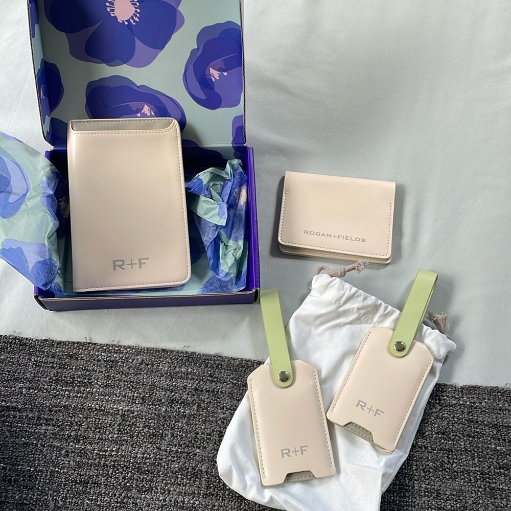 Brand new Rodan + Fields luggage tags & passport set (brand new)